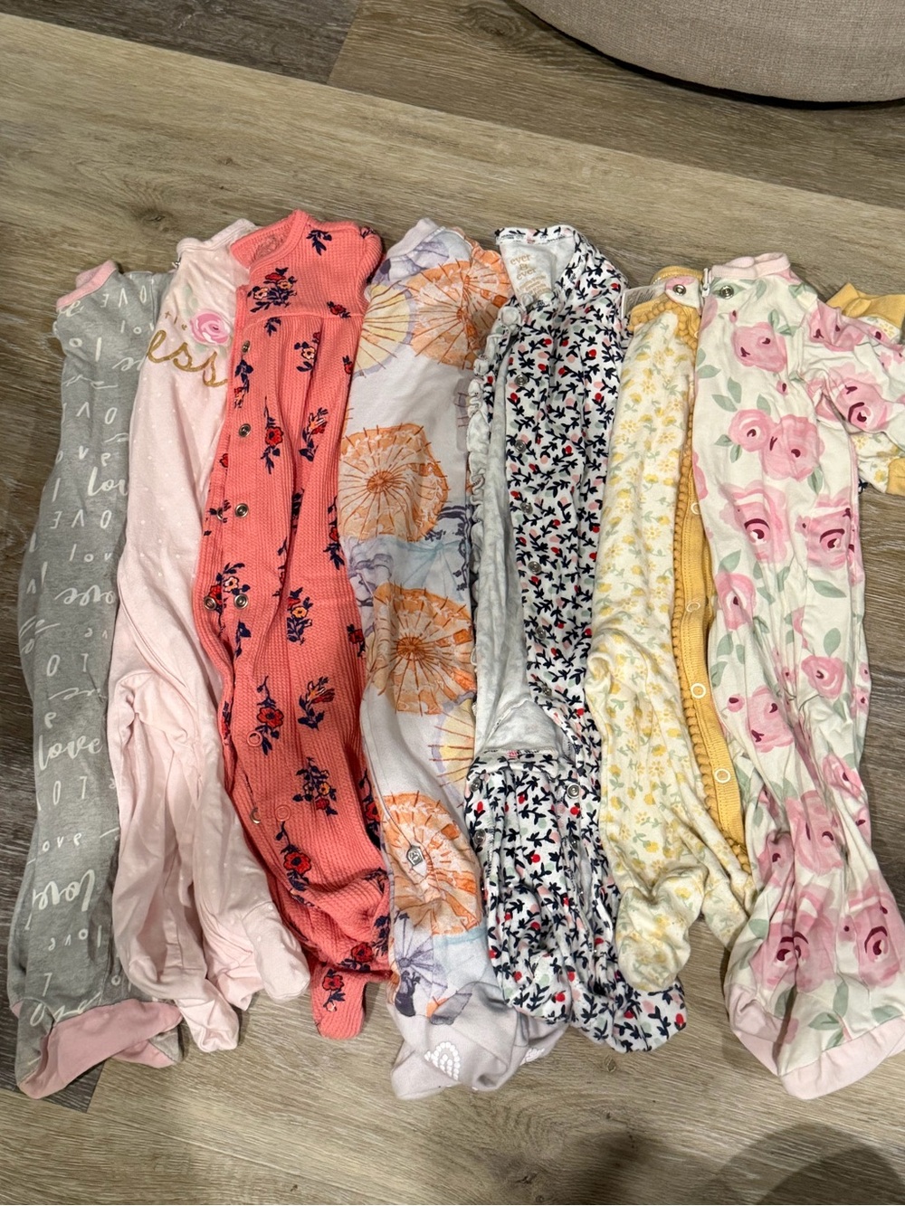 Bundle of 7 (6-9 month) footie sleepers